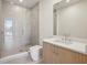 Clean bathroom with light wood vanity and glass shower at 2425 Peachtree Ne Rd # 701, Atlanta, GA 30305