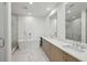 Modern bathroom with double vanity, large soaking tub, and glass shower at 2425 Peachtree Ne Rd # 701, Atlanta, GA 30305