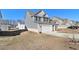 Two-story house with gray siding, brick accents, and a white door at 412 Vermeer Ct, Locust Grove, GA 30248