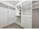 A well-organized walk-in closet with ample shelving and drawers at 1134 Ferncliff Ne Rd, Atlanta, GA 30324