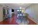 Open concept dining area with hardwood floors at 5400 Roswell Rd # P2, Atlanta, GA 30342