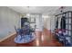 Open concept dining area with hardwood floors and view into kitchen and living room at 5400 Roswell Rd # P2, Atlanta, GA 30342