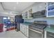 Modern kitchen with stainless steel appliances and white cabinets at 5400 Roswell Rd # P2, Atlanta, GA 30342