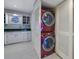 Convenient laundry area with stacked washer and dryer at 5400 Roswell Rd # P2, Atlanta, GA 30342
