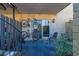 Small patio with seating, bicycle storage, and access to the interior at 5400 Roswell Rd # P2, Atlanta, GA 30342