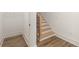 Basement with wood-look flooring and a staircase at 628 Robinson Se Ave # B, Atlanta, GA 30312