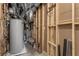 Unfinished basement with water heater and HVAC unit at 628 Robinson Se Ave # B, Atlanta, GA 30312