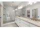 Modern bathroom with double vanity and large walk-in shower at 628 Robinson Se Ave # B, Atlanta, GA 30312