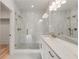 Elegant bathroom featuring a walk-in shower and double vanity at 628 Robinson Se Ave # B, Atlanta, GA 30312