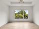 Light-filled bedroom featuring hardwood floors and a large window at 628 Robinson Se Ave # B, Atlanta, GA 30312