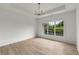Bright bedroom with hardwood floors and large window at 628 Robinson Se Ave # B, Atlanta, GA 30312