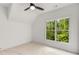 Bright bedroom with large window, ceiling fan and carpet at 628 Robinson Se Ave # B, Atlanta, GA 30312