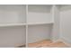 Spacious closet with shelves and hanging rods at 628 Robinson Se Ave # B, Atlanta, GA 30312