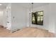 Bright dining room features hardwood floors and a large window at 628 Robinson Se Ave # B, Atlanta, GA 30312