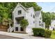 Two-story craftsman style home with gray siding, white trim, and a detached two-car garage at 628 Robinson Se Ave # B, Atlanta, GA 30312