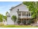 Gray house with a porch, deck, and landscaping at 628 Robinson Se Ave # B, Atlanta, GA 30312