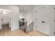 Hallway with light wood floors, and access to laundry and bathroom at 628 Robinson Se Ave # B, Atlanta, GA 30312