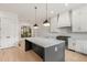 Modern kitchen featuring a large island and white shaker cabinets at 628 Robinson Se Ave # B, Atlanta, GA 30312
