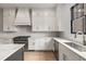 Modern kitchen with white cabinets, subway tile backsplash at 628 Robinson Se Ave # B, Atlanta, GA 30312