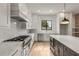 Modern kitchen with stainless steel appliances and marble countertops at 628 Robinson Se Ave # A, Atlanta, GA 30312