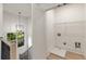 Laundry room with built-in shelving and utility sink at 628 Robinson Se Ave # B, Atlanta, GA 30312