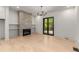 Light and bright living room with fireplace and French doors at 628 Robinson Se Ave # B, Atlanta, GA 30312