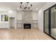 Living room featuring a fireplace and built-in shelving at 628 Robinson Se Ave # B, Atlanta, GA 30312