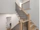 Light oak staircase with black metal balusters at 628 Robinson Se Ave # B, Atlanta, GA 30312