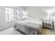 Spacious bedroom with large window and neutral decor at 2605 Poplar Ln, Cumming, GA 30041