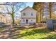 Two-story house with deck and fenced backyard at 2605 Poplar Ln, Cumming, GA 30041