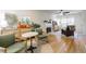 Open concept living space with hardwood floors and a fireplace at 2605 Poplar Ln, Cumming, GA 30041