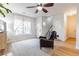Spacious living area featuring hardwood floors and ample natural light at 2605 Poplar Ln, Cumming, GA 30041