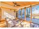 Bright and airy screened porch with wooden ceiling and comfortable seating at 2605 Poplar Ln, Cumming, GA 30041
