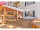 Spacious screened porch with wooden deck and seating at 2605 Poplar Ln, Cumming, GA 30041