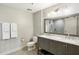 Spa-like bathroom with double vanity, marble countertop, and a large shower at 3235 Roswell Ne Rd # 718, Atlanta, GA 30305