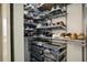 Spacious closet with custom built-in shelving and drawers at 3235 Roswell Ne Rd # 718, Atlanta, GA 30305