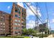 Brick building with arched windows and signage at 3235 Roswell Ne Rd # 718, Atlanta, GA 30305