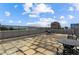 Urban rooftop patio with seating and city views at 3235 Roswell Ne Rd # 718, Atlanta, GA 30305