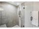Large walk-in shower with gray tile and glass enclosure at 3235 Roswell Ne Rd # 718, Atlanta, GA 30305