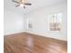 Spacious bedroom with hardwood floors and large windows at 5614 Central Church Rd, Douglasville, GA 30135