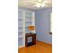 Bedroom with built-in shelving, hardwood floors, and ceiling fan at 6 Turner Ln, Dallas, GA 30157