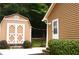 Tan shed with white accents and a double door at 6 Turner Ln, Dallas, GA 30157