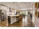 Modern kitchen with large island, stainless steel appliances, and hardwood floors at 1023 Brandsford Nw St, Atlanta, GA 30318