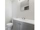 Simple bathroom with gray vanity and white countertop at 213 Yuba Walk, Lawrenceville, GA 30046