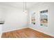 Spacious dining area with hardwood floors and large windows at 615 Royal Crescent Aly, Canton, GA 30115