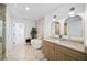 Spa-like bathroom with a freestanding tub and double vanity at 729 Martin Se St, Atlanta, GA 30315