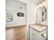 Modern bathroom with a floating vanity and oval mirror at 729 Martin Se St, Atlanta, GA 30315