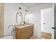 Modern bathroom with double vanity and stylish light fixtures at 729 Martin Se St, Atlanta, GA 30315