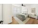 Serene bedroom with wood floors and large window at 729 Martin Se St, Atlanta, GA 30315