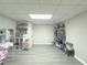 Finished basement room with clothing rack at 8791 Daerwater Dr, Winston, GA 30187